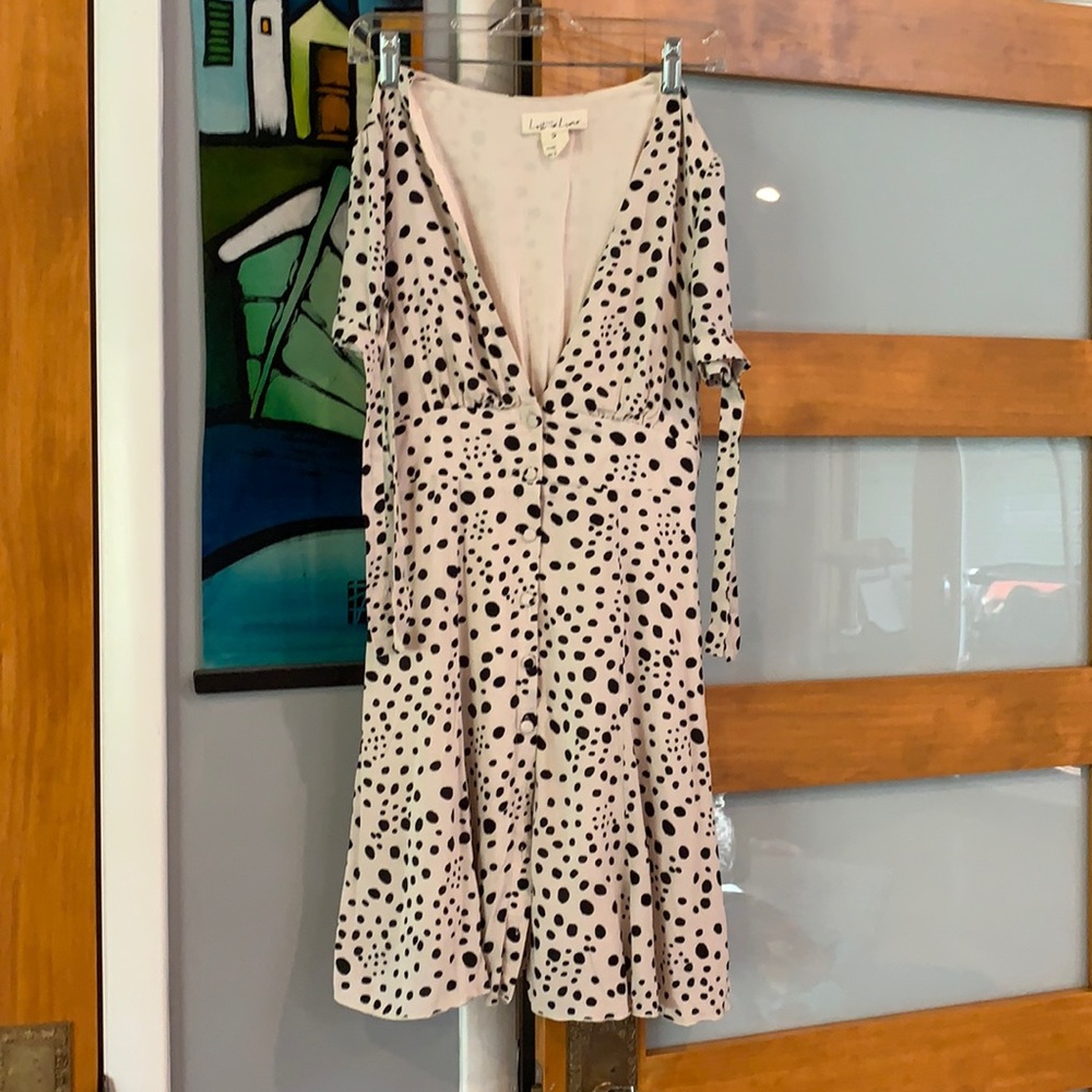 Black polka dot mini dress